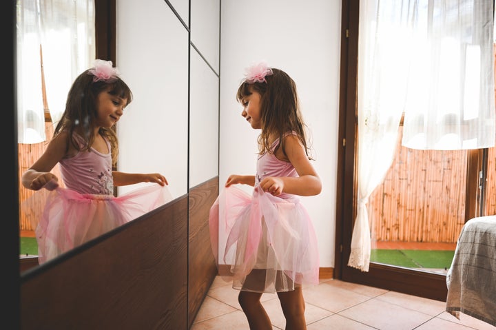 "By adolescence, children are already primed to be preoccupied with how they look," the author writes.