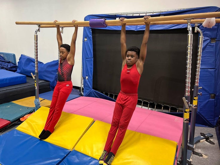 Boys practicing a routine.