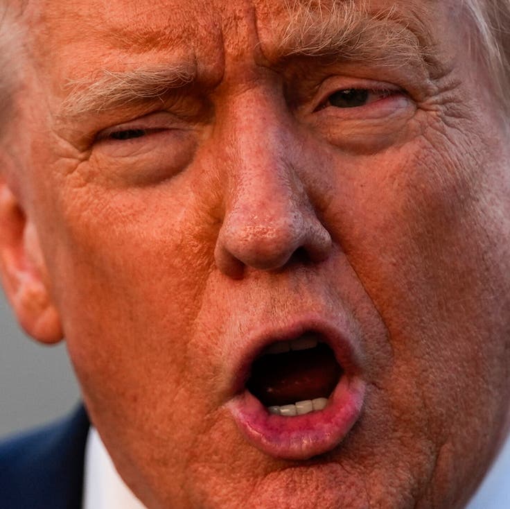 President Donald Trump speaks Sunday with reporters at Lehigh Valley International Airport in eastern Pennsylvania. 